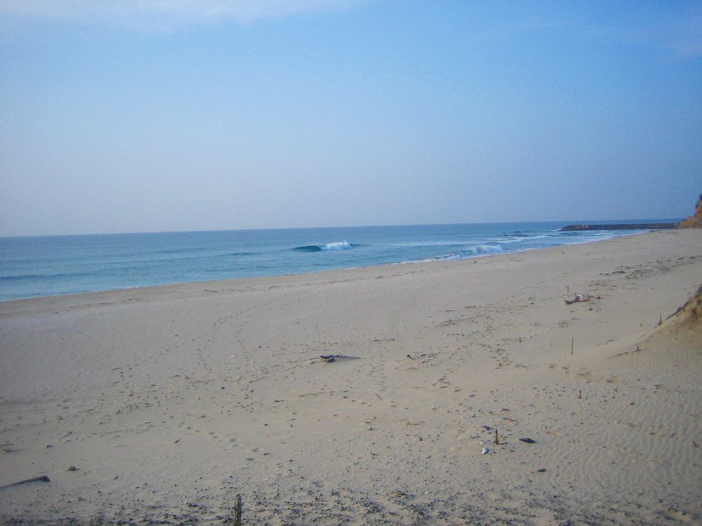 Surfing and space in Tanegashima island, Kagoshima, Japan. It is a wave at the point "In front of Tanegashima Iwasaki Hotel".