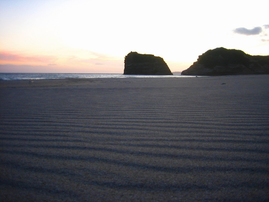 Surfing and space in Tanegashima island, Kagoshima, Japan. The beach is at the surfing point "In front of Tanegashima Iwasaki Hotel".