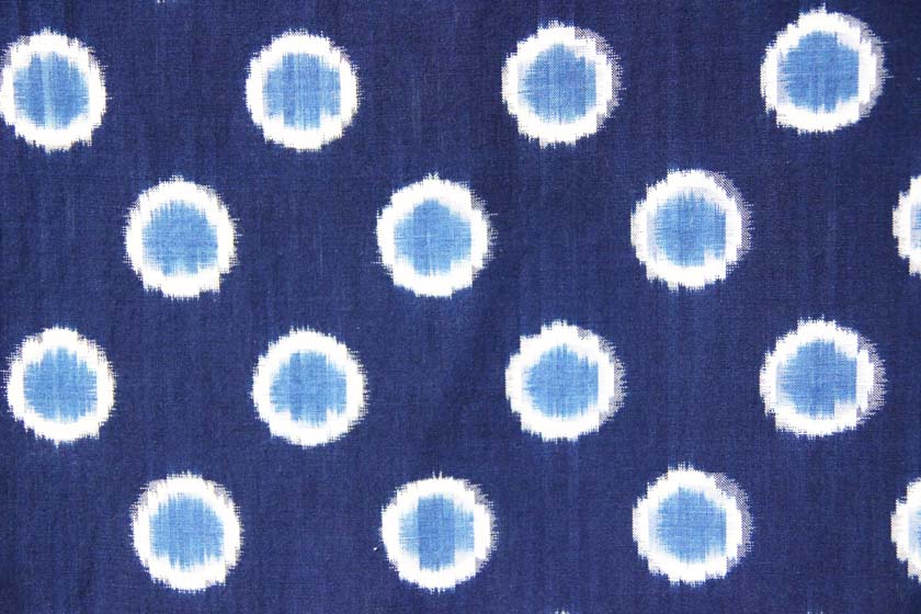 Kurume Kasuri by Takeshi Yamamura. The pattern is a white and light blue circle on an indigo cloth.