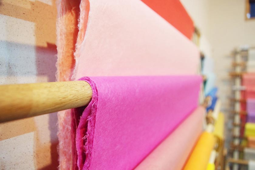 Purple, peach, and other colors of Japanese paper Washi made at the Matsuo Washi Workshop in Yame.