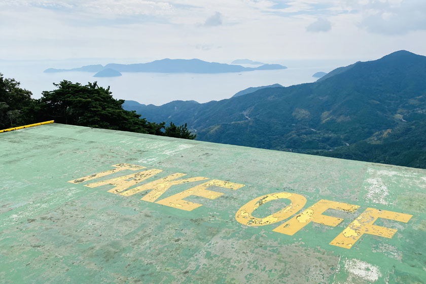 The launcher for hang gliders and paragliders at the summit of Mt. Dake in Suo Oshima island. You can get a fine view of the sea from here.